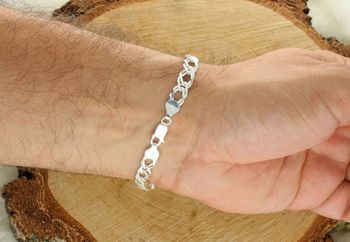 Bransoletka męska srebrna próby 925, szerokość 8 mm, długość 23 cm, waga 13,40 g. Model DIA-BRA-571371-120-925 z solidnym zapięciem na karabińczyk. Elegancki, męski dodatek na każdą okazję.3.jpg
